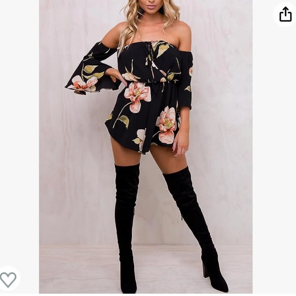 NWOT. Black flowy floral off the shoulder 3/4 sleeve romper. - Picture 3 of 11